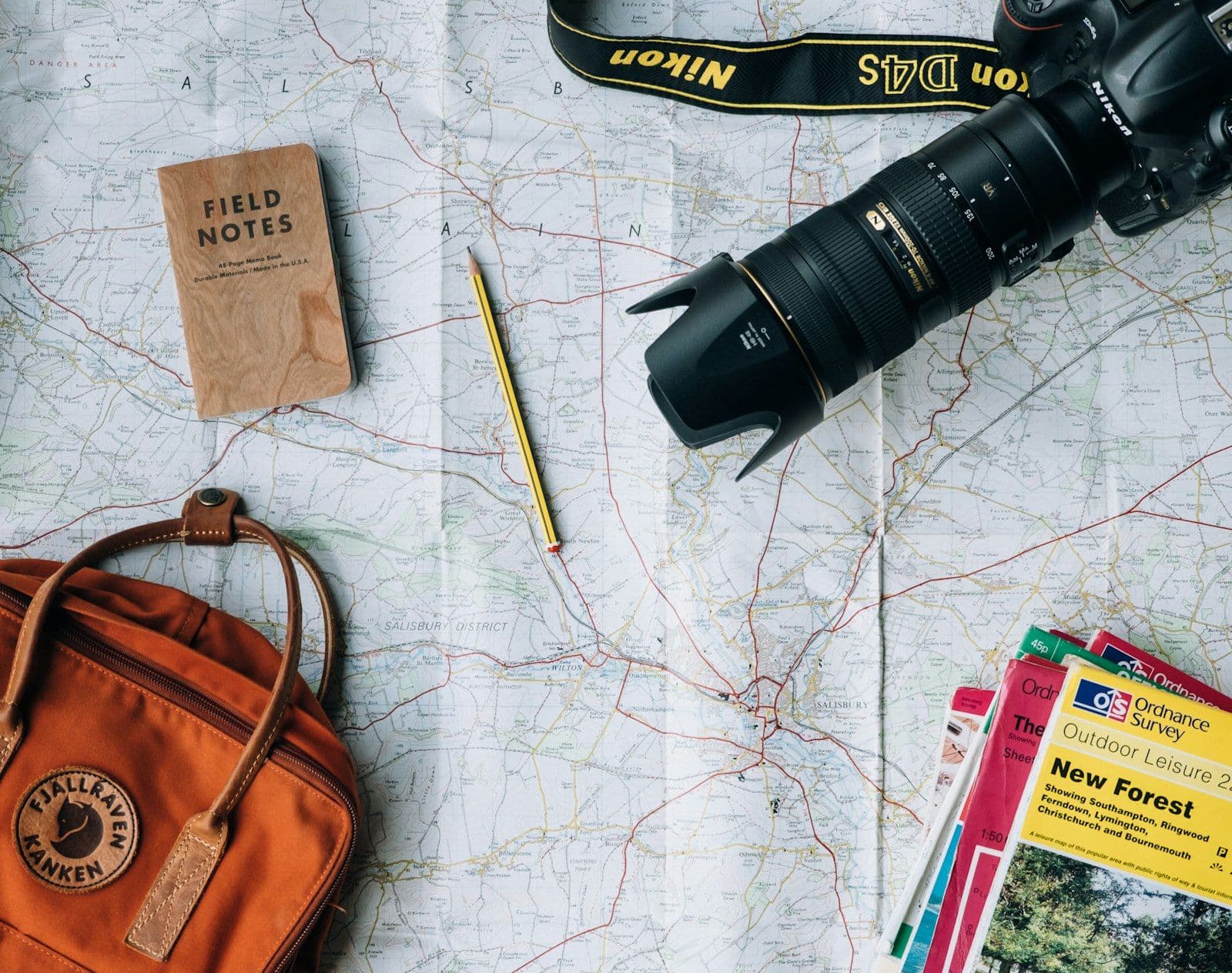 Traveller's suitcase and passport prepared for an international journey